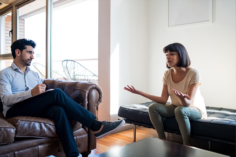 Patient speaking with a therapist during individual therapy in Jacksonville, FL Patient speaking with a therapist during individual therapy in Jacksonville, FL