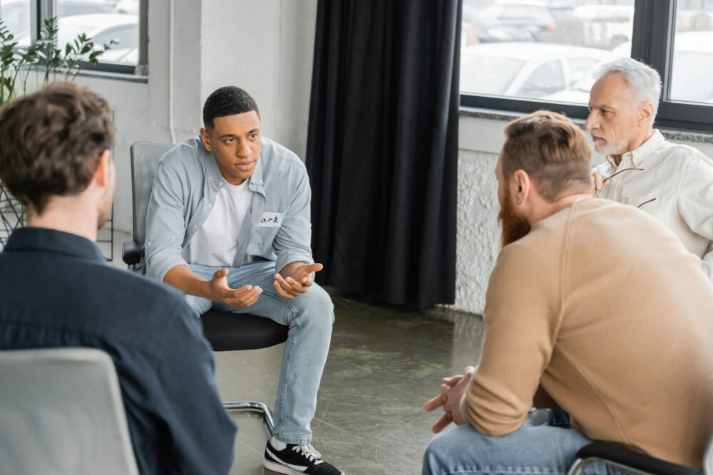 Patients working together in a group therapy session for detox and recovery in Jacksonville, Florida Patients working together in a group therapy session for detox and recovery in Jacksonville, Florida