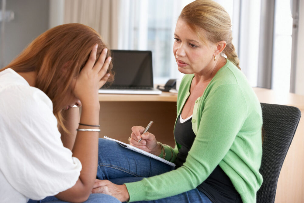 Therapist listening to a patient during individual therapy in Jacksonville, FL Therapist listening to a patient during individual therapy in Jacksonville, FL
