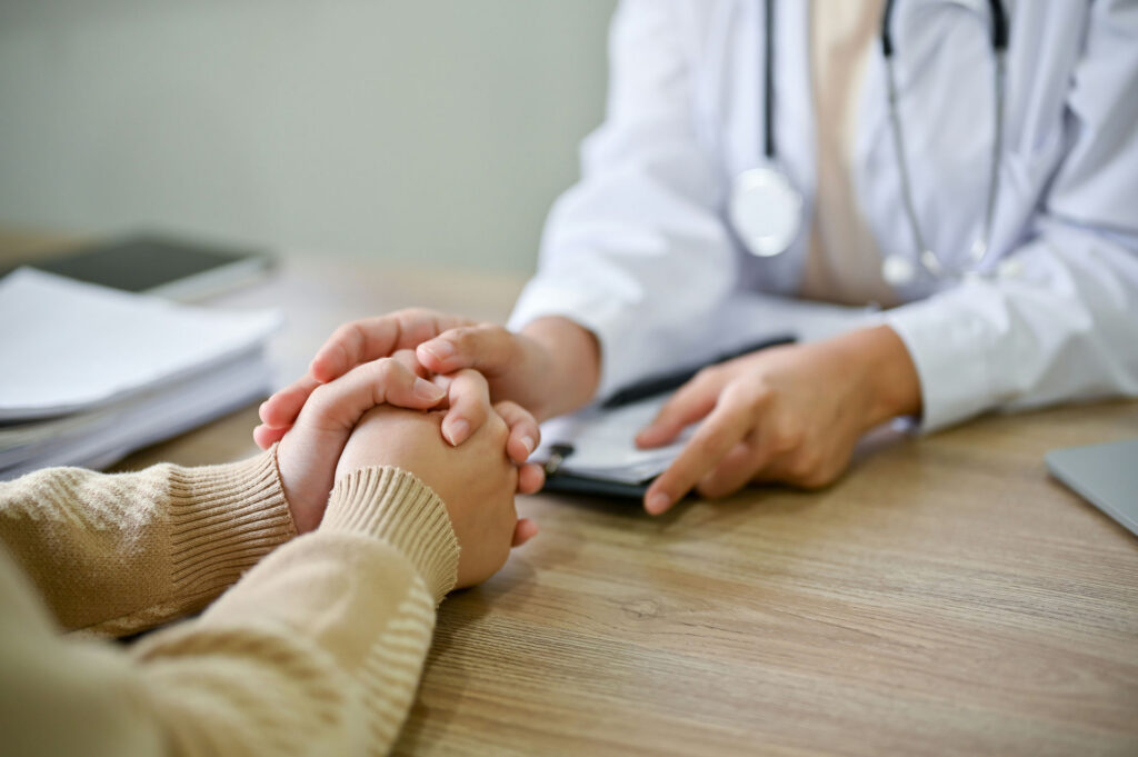Physician advising patient about indications for detox treatment