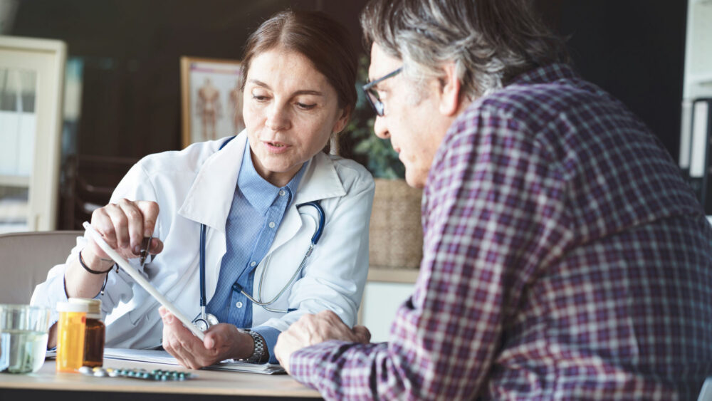 stimulant-addiction-rehab therapist guiding older man through stimulant rehab